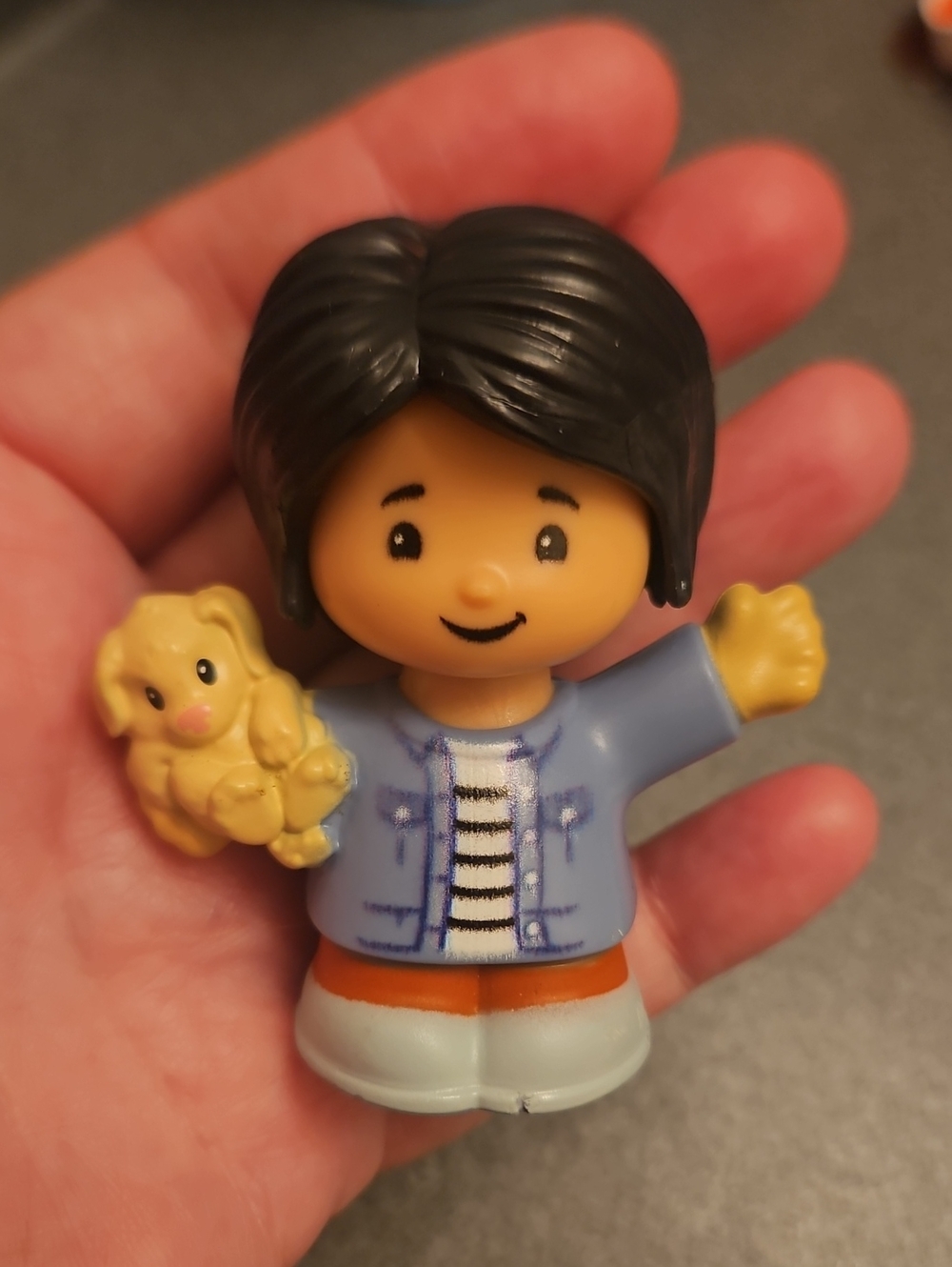 Fisher-Price Little People figure, specifically a "Mom" or "Woman" character